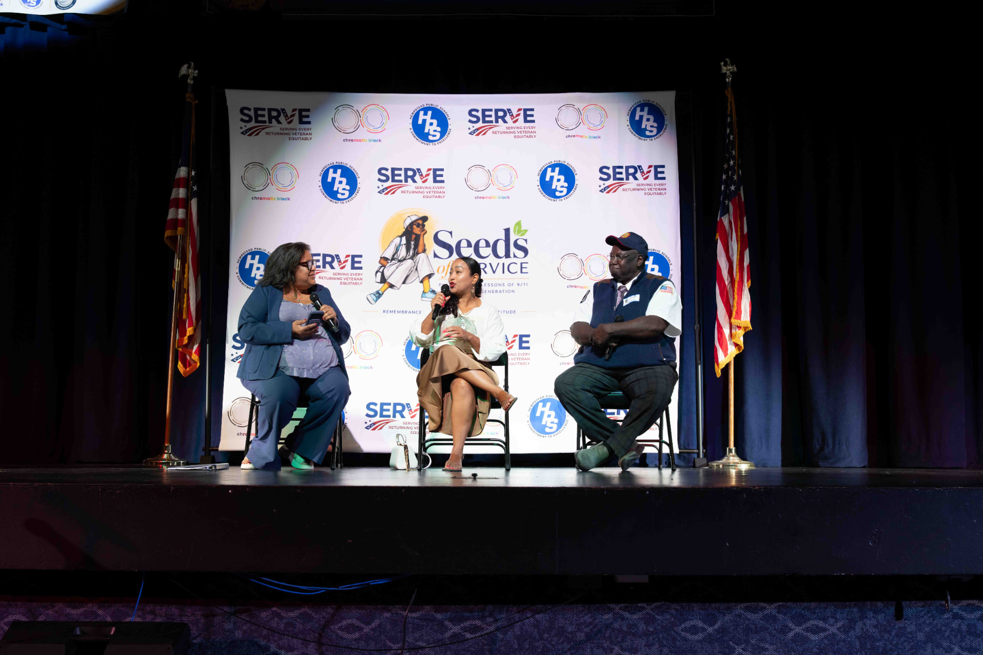 Panelists Catherine McKenzie, Dawn Gonzales and Anthony “AJ” Knight on stage